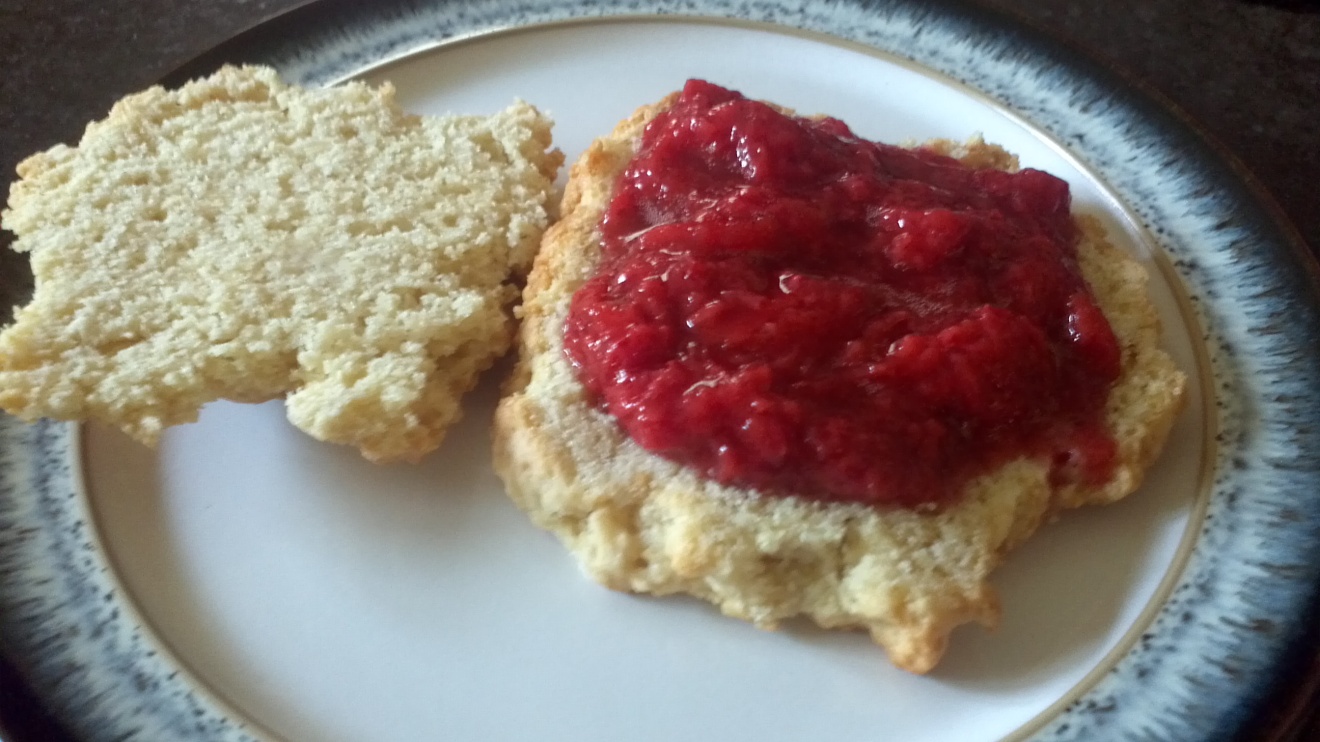 Place a generous serving of the strawberry mousse on the bottom part of your scone